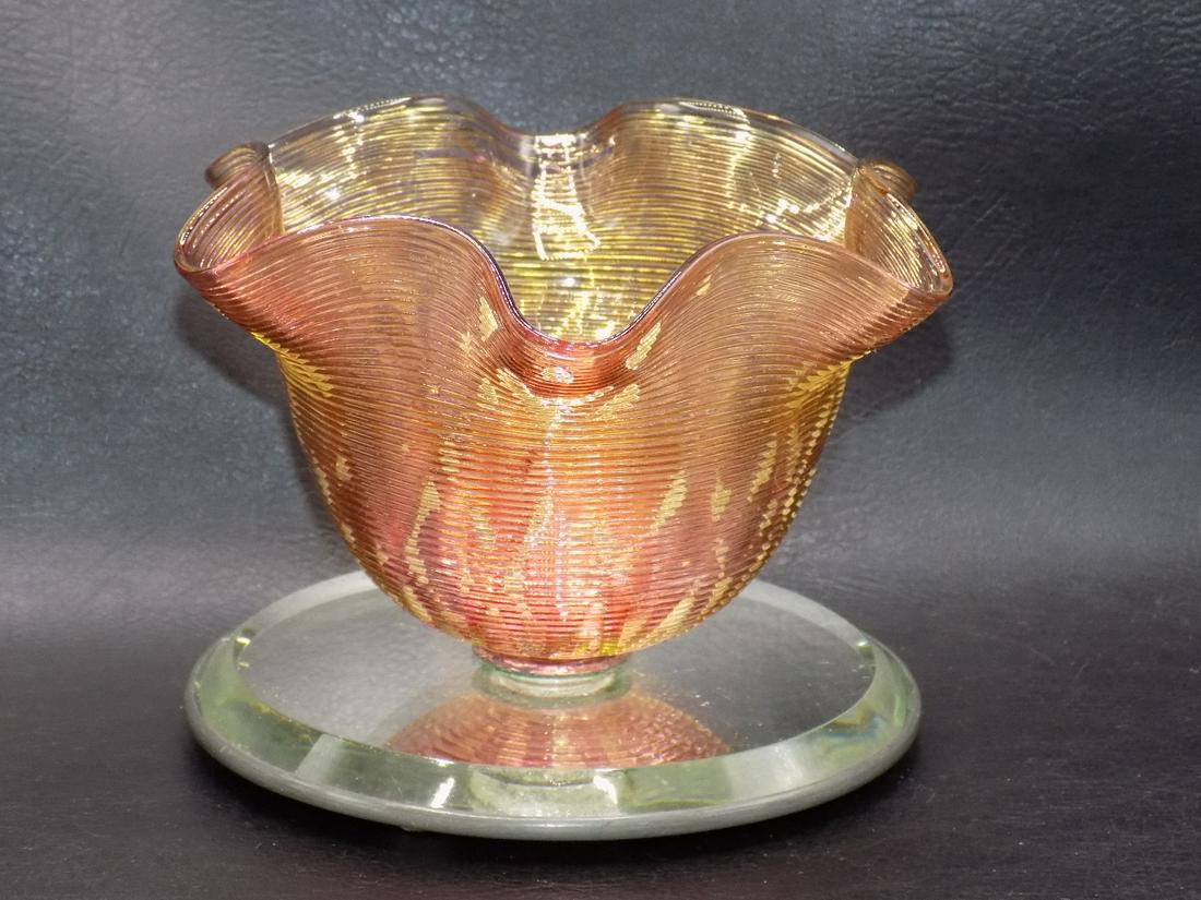 Unusual antique cranberry threaded art glass bowl with beveled mirror base: Unusual antique cranberry threaded art glass bowl with beveled mirror base. Beautiful colors. Great quality and detail. In very good original as found condition. 4 1/8 inches tall x 5 ½ wide at b