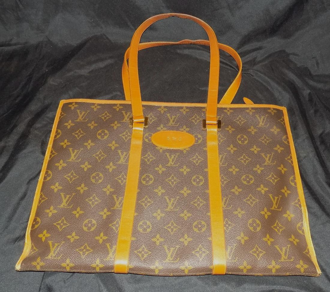 Vintage Louis Vuitton satchel or purse: Vintage Louis Vuitton satchel or purse. In very good original as found condition as shown in photos. Great quality and detail. 16 ½ inches x 12 inches. Came with same collection as suitcase and a
