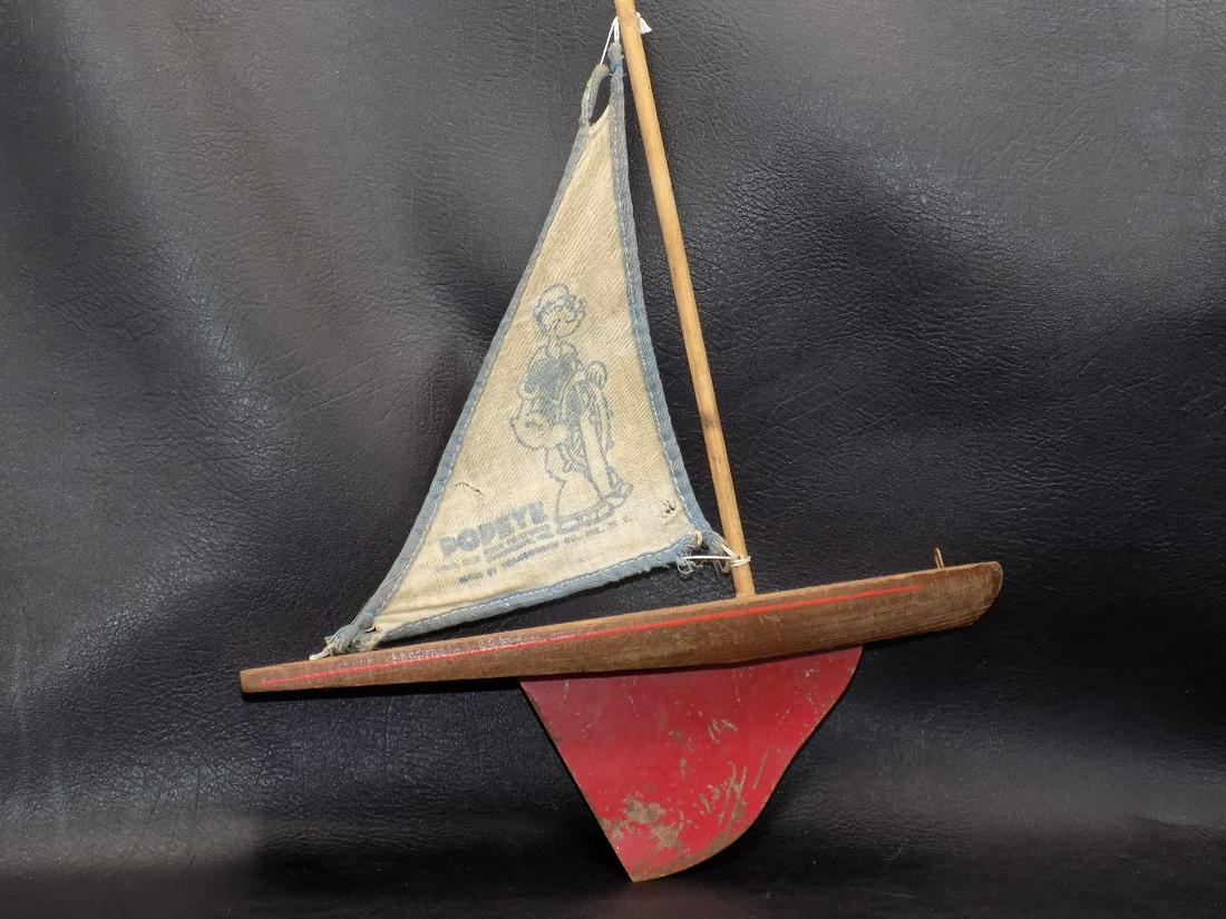 Vintage Popeye sailboat.: Vintage Popeye sailboat. Beautiful colors. In very good original as found condition. Wear as shown photos. Wood boat. Cloth sail. 9 ¾ long x 11 inches tall