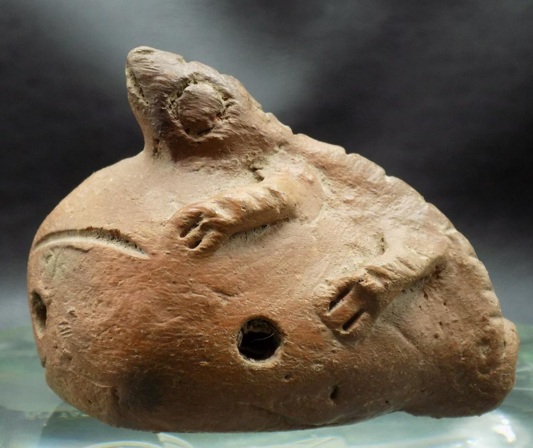 Antique effigy clay whistle or flute: Antique effigy clay whistle or flute. Looks to be a lizard on top. In very good original as found condition. Great quality and detail. 2 inches tall x 2 3/8 long x 1 ¾ inches wide