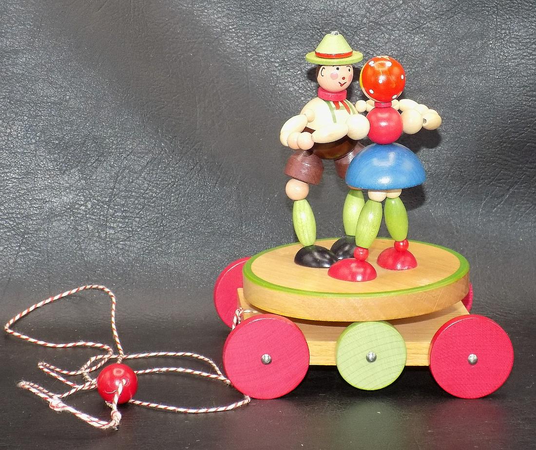 Vintage Austrian pull toy with rotating dancers: Vintage Austrian pull toy with rotating dancers. Wood. Like new condition. Beautiful colors. Marked as shown in photos. 5 ¾ inches tall x 4 ¾ long x 3 ¾ inches wide