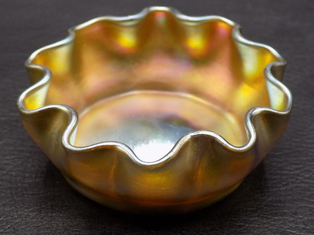 Antique signed Tiffany salt.: Antique signed Tiffany salt. Beautiful colors and iridescence. Signed as shown in photo. In very good original as found condition