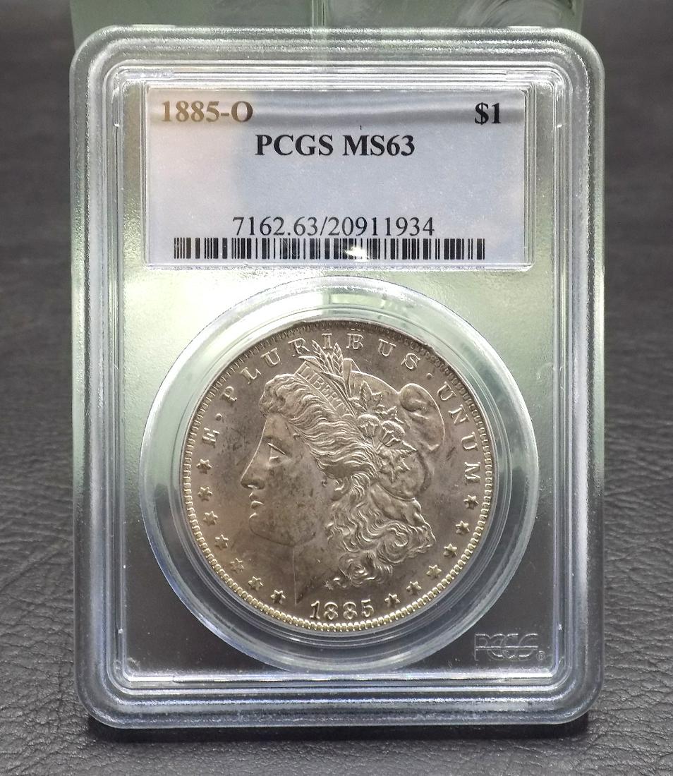 1885 O Graded MS63 PCGS Morgan silver dollar (1 of 3)