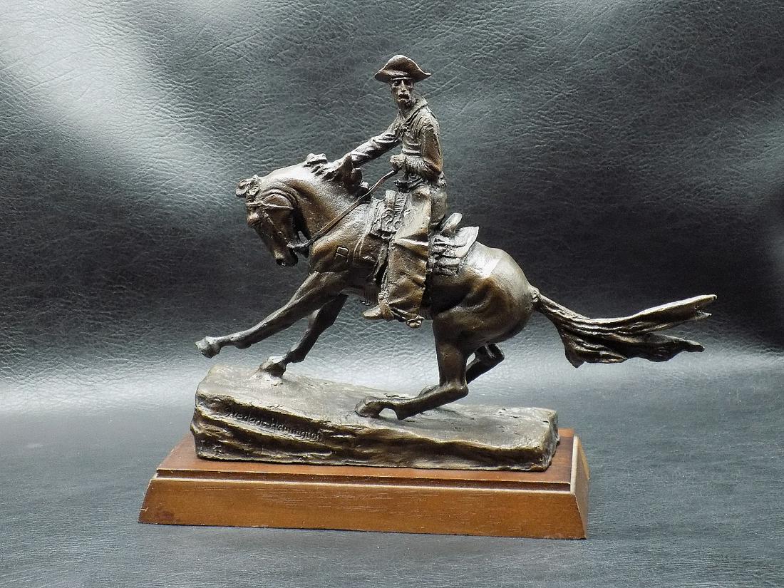 Frederic Remington Art Museum bronze: Frederic Remington Art Museum bronze. The Cowboy. Marked on label on bottom as shown in photo. Marked Remington on base of figure. Official issue 1988 The Franklin Mint. 6 ¾ tall sitting on base