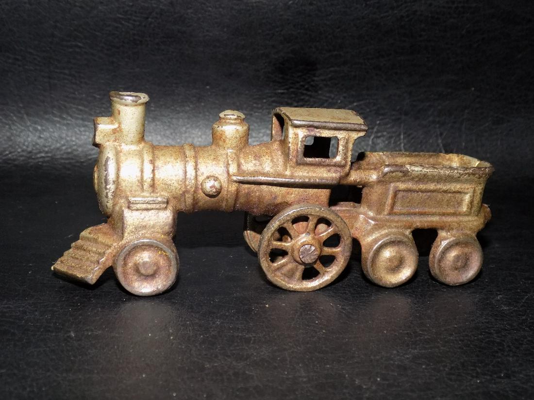 Antique cast iron toy train engine and coal car (1 of 6)