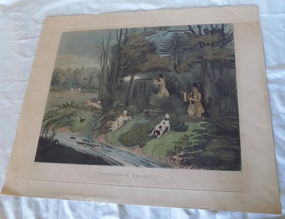 2 vintage colorful hunting prints or lithographs with dogs: 2 vintage colorful hunting prints or lithographs with dogs. In very good original as found condition with wear to borders due to normal age. Beautiful colors. Great quality and detail.