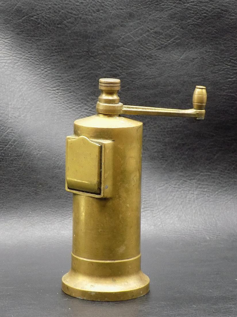 Antique brass pepper grinder. Working condition: Antique brass pepper grinder. Working condition. Great quality and detail. No makers marking. 5 ¼ inches tall x 2 1/8 wide at base