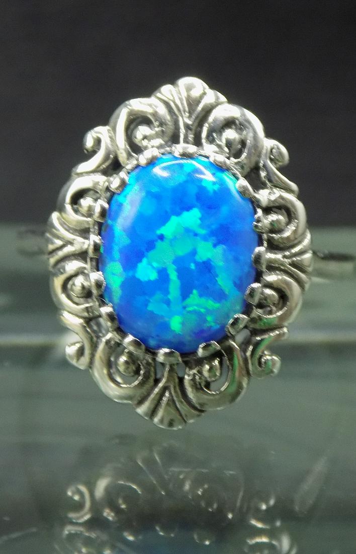 Beautiful 2 cwt blue fire opal sterling silver ring (1 of 4)