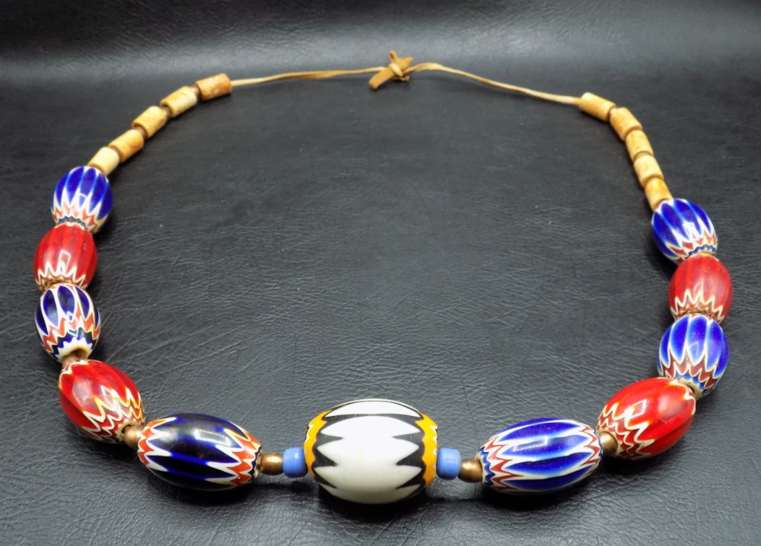 Great Native American Indian chevron trade bead necklace: Great Native American Indian chevron trade bead necklace. Venetian beads. Beautiful colors. Great quality and detail. Large Bead measure 1 ½ inches and 1 1/2 smaller beads. 1 large beads and 10