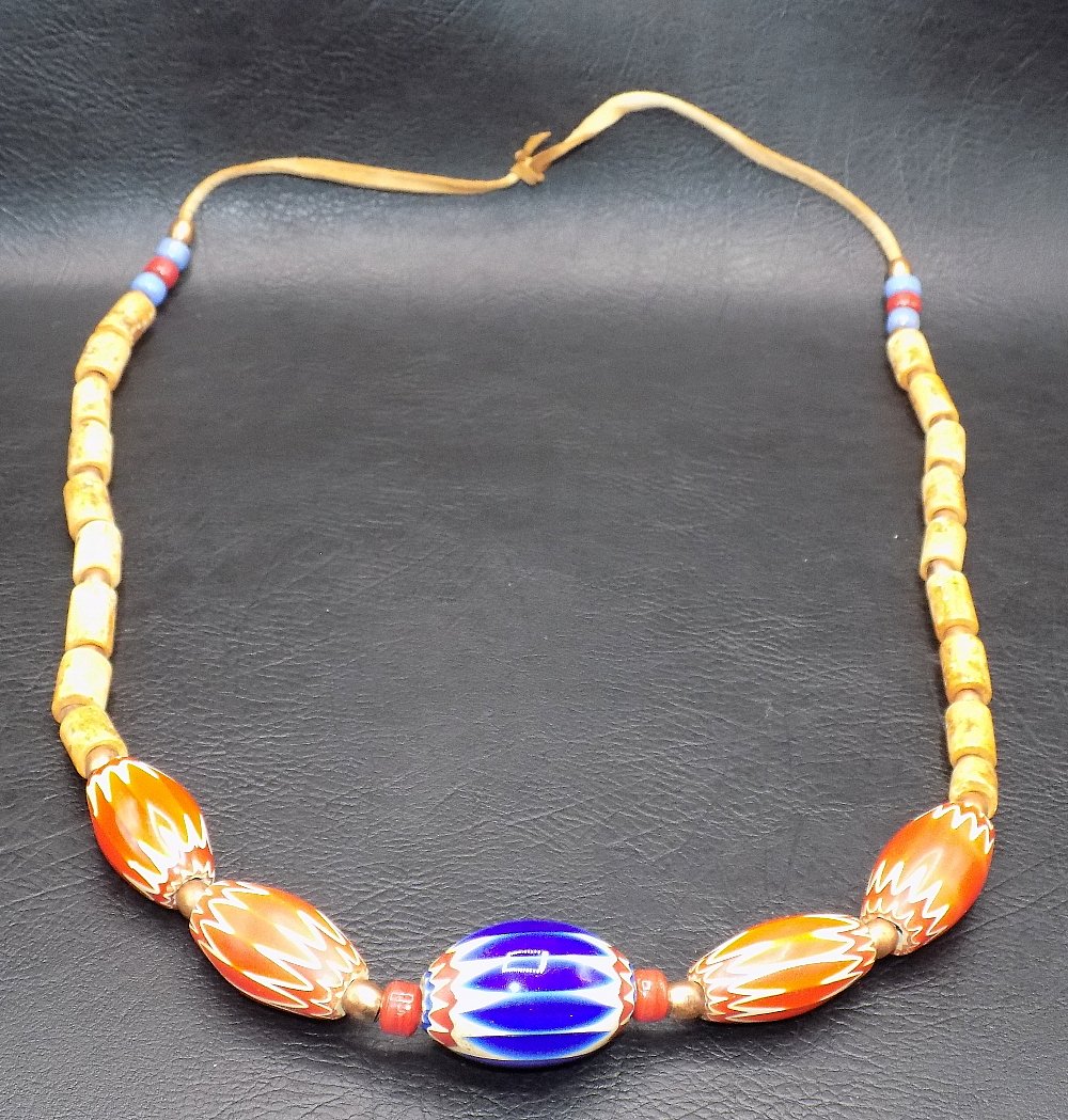 Great Native American Indian chevron trade bead necklace: Great Native American Indian chevron trade bead necklace. Venetian beads. Beautiful colors. Great quality and detail. Large Bead measure 1 3/8 inches and 1 1/4 smaller beads. 1 large beads and 4 small