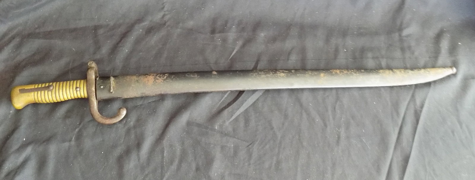 1874 military bayonet. Marked on blade, please see photos: 1874 military bayonet. Marked on blade, please see photos. Brass handle. Great quality and detail. With scabbard 28 inches. Without scabbard 27 ½ inches