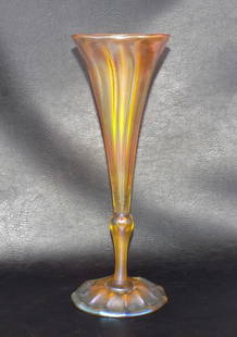 Marvelous antique signed Tiffany Favrile art glass Trumpet vase: Marvelous antique signed Tiffany Favrile art glass Trumpet vase. Beautiful iridescence. Signed on bottom as shown in photos. Great quality and detail. 10 &#188; tall 3 &#189; wide at top. Base 3 &#190