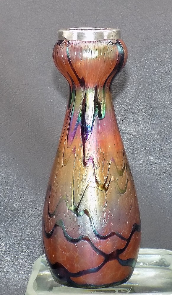 Lovely vintage Loetz style art glass vase with silver rim: Lovely vintage Loetz style art glass vase with silver rim. Beautiful iridescence. Great quality and detail. Touchmarks on silver rim as shown in phots. 6 5/8 inches tall