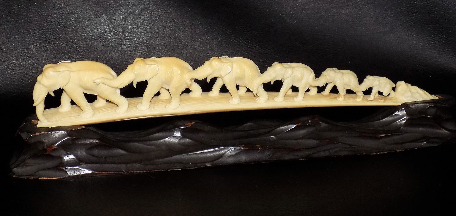 Antique Oriental hand carved elephants on wood base (1 of 8)