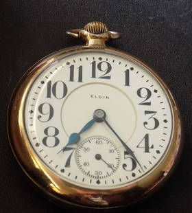 High grade antique Elgin Father Time 21 jewel railroad grade pocket watch: High grade antique Elgin Father Time 21 jewel railroad grade pocket watch. Gold fill case. Porcelain dial. Running at time of listing. Please see photo for serial number and works. 2 1/8 diameter