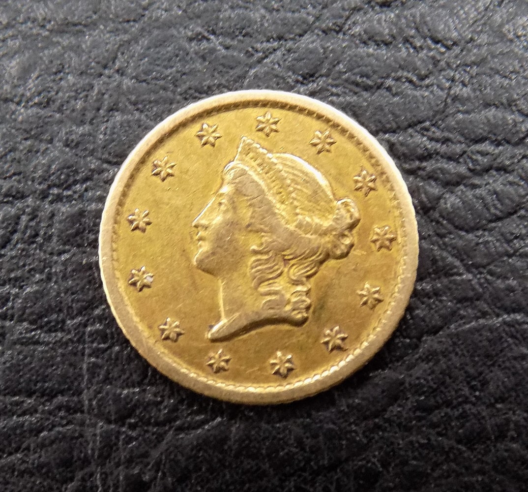 Higher grade 1853 O Liberty Head one dollar gold coin (1 of 2)