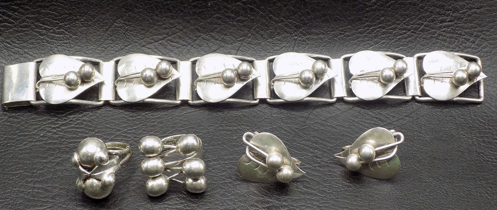 vintage sterling silver bracelet and earrings and two rings."in the manner of William Spratling" (1 of 10)