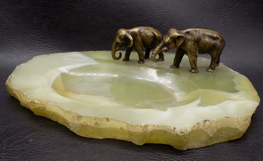 Vintage bronze elephants and onyx tray: Vintage bronze elephants and onyx tray. Marked Germany on bottom. In very good original as found condition. Beautiful onyx. Great quality and detail. Tray7 ½ x 4 ¼ inches. Tallest elepha