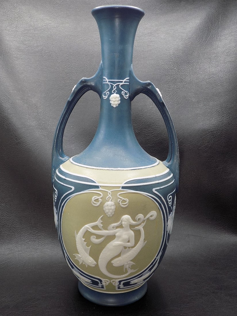Vintage Art Nouveau Mettlach vase: Vintage Art Nouveau Mettlach vase. With mermaid and fish. Three dimensional decoration. Beautiful colors. Great quality and detail. In very good original as found condition. Marked on bottom as shown