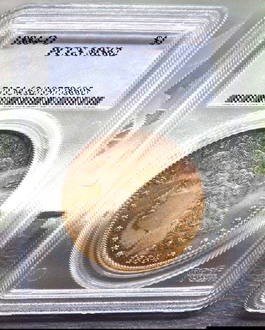 Uncirculated 1884 O Morgan PCGs graded MS62 silver dollar (1 of 4)