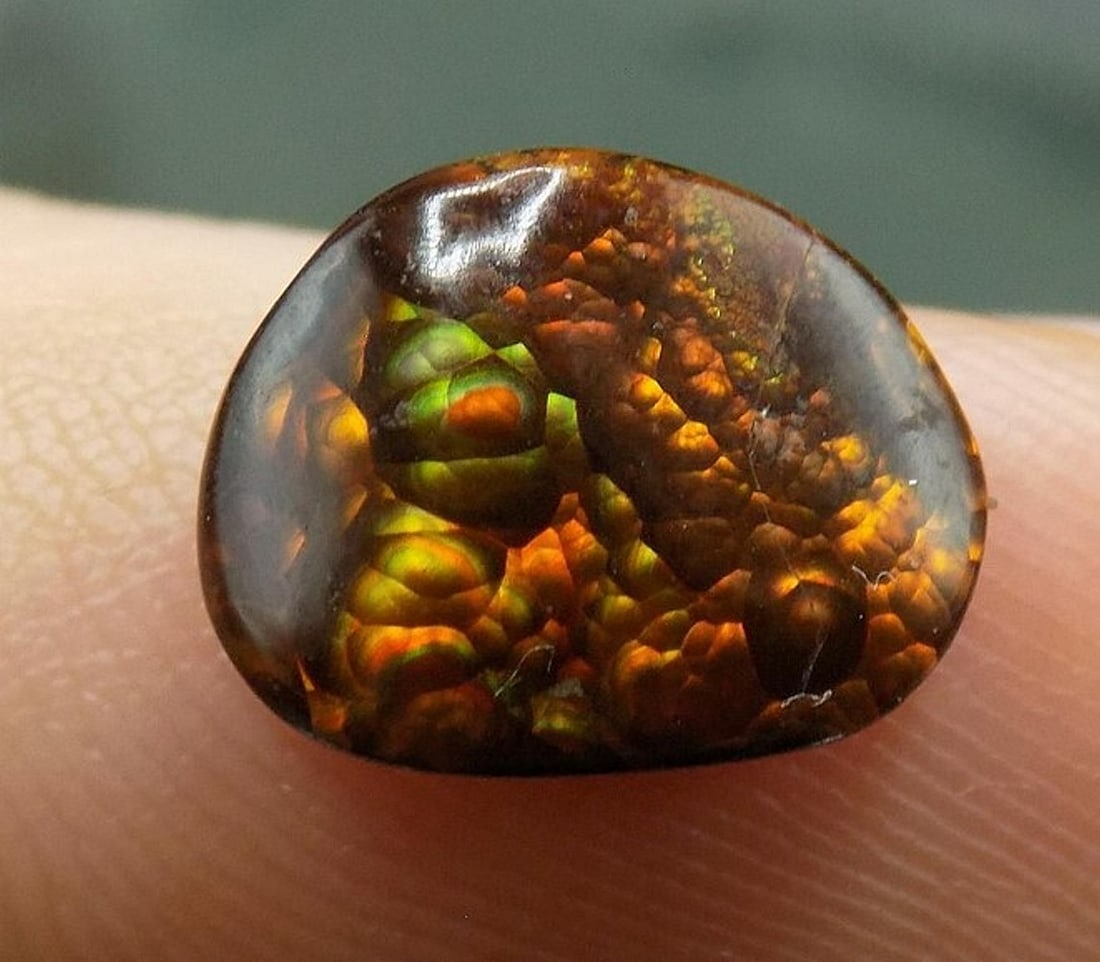 Beautiful approximately 2 ct. natural fire agate gemstone (1 of 5)