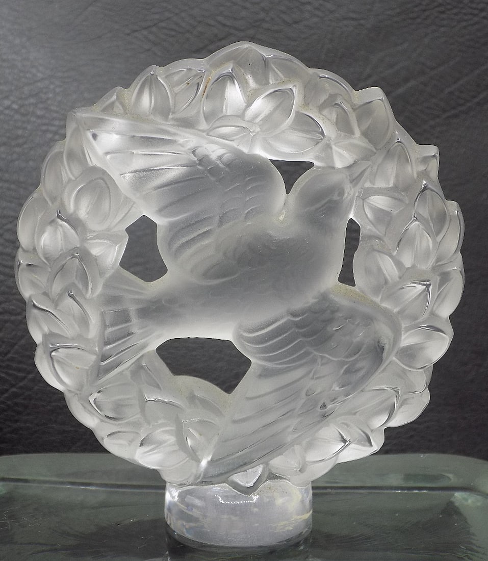 Wonderful signed Lalique art glass bird in wreath: Wonderful signed Lalique art glass bird in wreath. Signed on bottom as shown in photo. Great quality and detail. In very good original as found condition. Measures 3 1/4 inches tall by 3 wide.