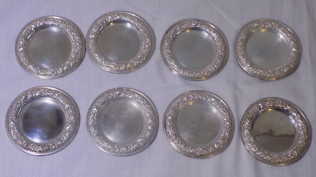 Fabulous set of eight S. Kirk and Son Repousse butter pats: Fabulous set of eight S. Kirk and Son Repousse butter pats. Marked S. Kirk and Son Sterling 10 on bottom as shown in photos. Very elaborate detailed three dimensional floral decoration. No condition p