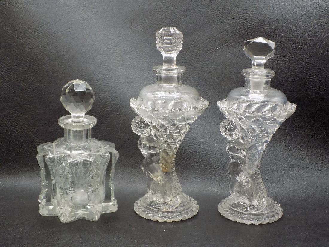 Three vintage perfume bottles.  Two with children (1 of 7)