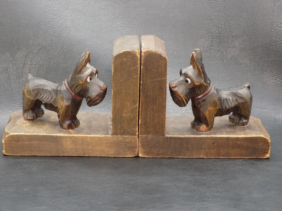Cute vintage hand carved Scottie dog bookends: Cute vintage hand carved Scottie dog bookends. Great quality and detail. In very good original as found condition with minor wear to finish normal from use and age. Single end 5 inches long x 2 &frac1