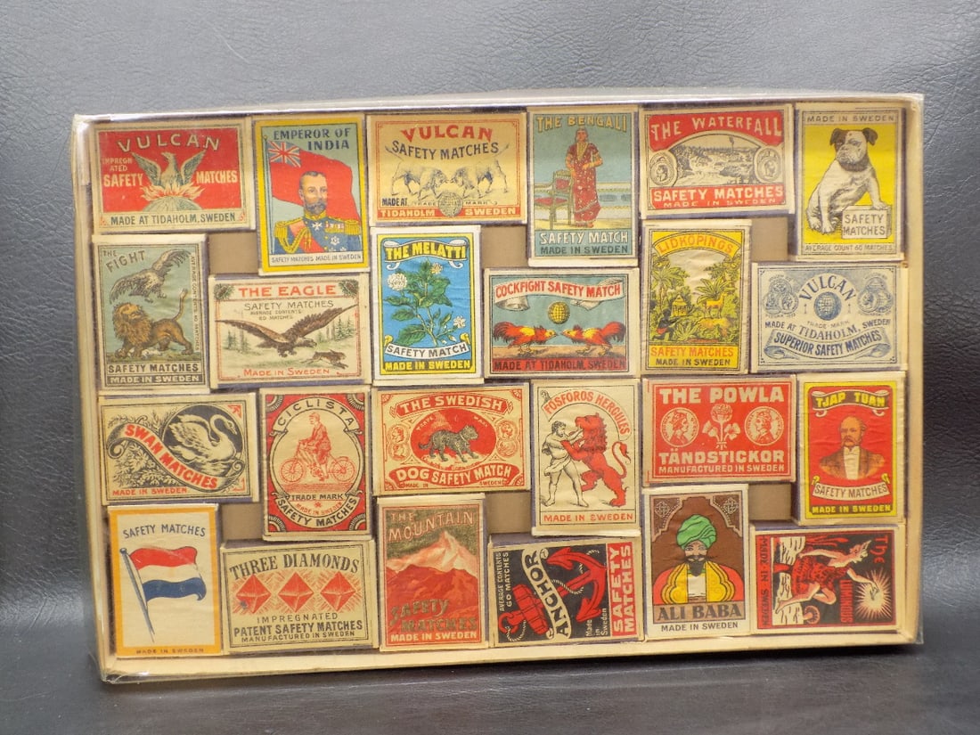 Fabulous collection of 49 vintage advertising wood match boxes: Fabulous collection of 49 vintage advertising wood match boxes. Great graphics. Container has labels surrounding border. Jonkoping Vulcan Product. Made in Sweden. All boxes are in great condition as s