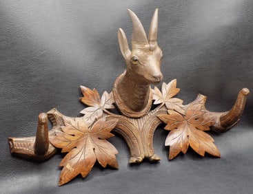 Beautiful antique hand carved Black Forest coat rack with deer head or Ibex