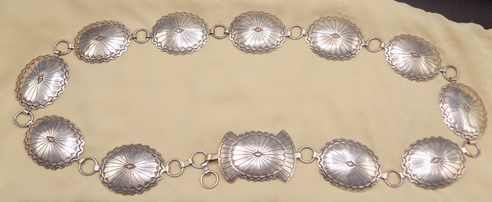 Vintage Native American Indian Artist signed sterling silver concho belt: Vintage Native American Indian Artist signed sterling silver concho belt. Buckle is marked as shown in photos. Great quality and detail. In very good original as found condition. Total length 37 &frac