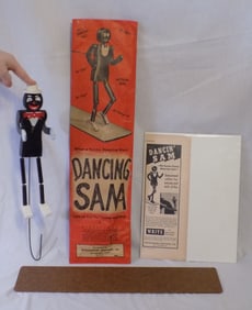 Vintage Black Americana Dancing Sam with paper container