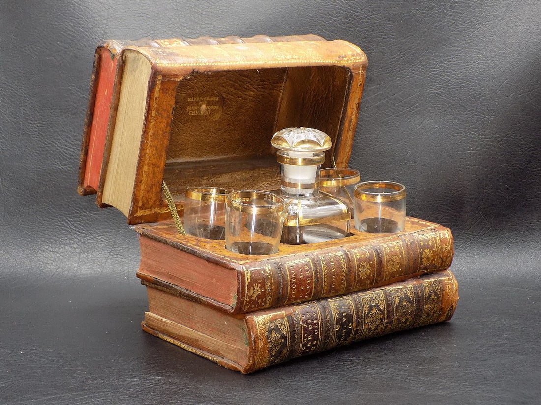 Most unusual antique hidden liquor set in books (1 of 9)