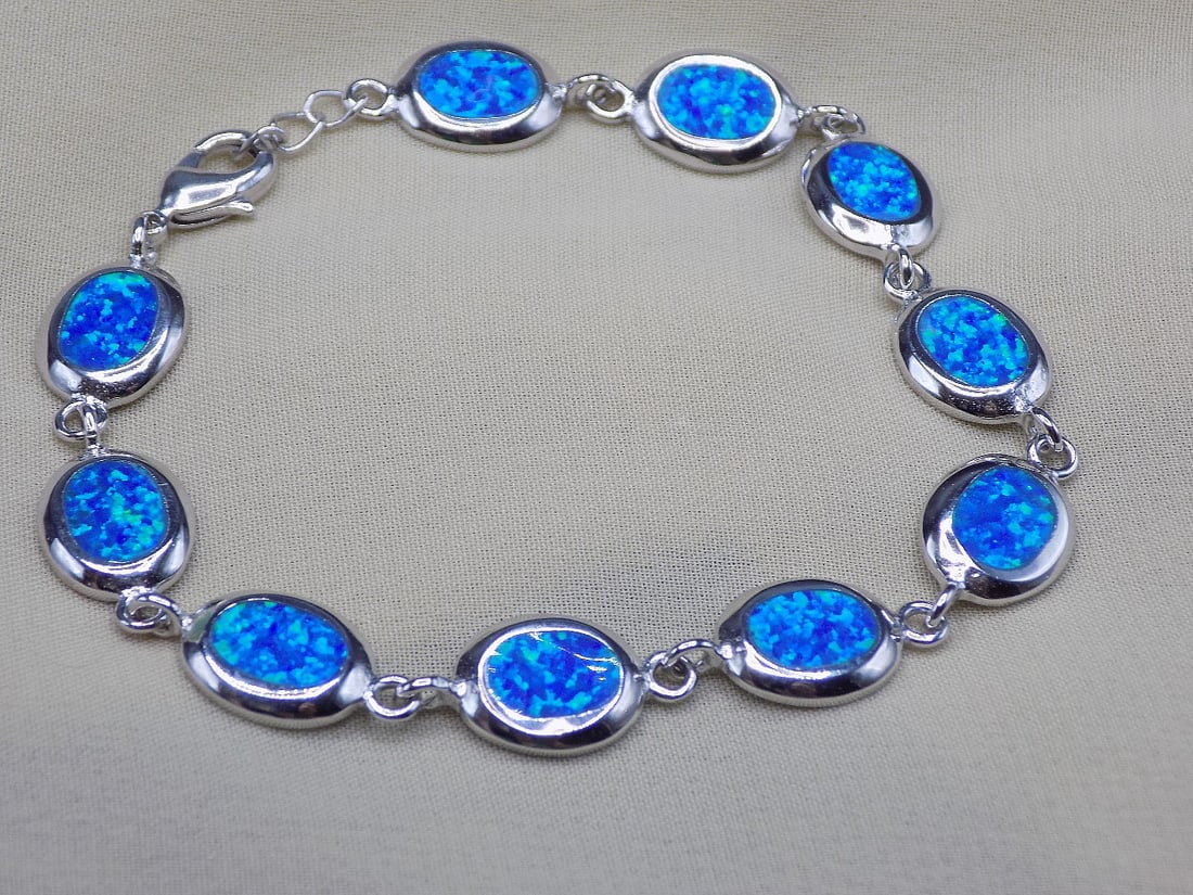 Beautiful Australian opals sterling silver bracelet (1 of 6)