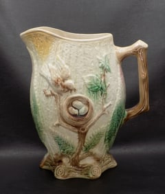 Fabulous antique Majolica pitcher with bird and eggs in next