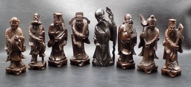 Eight nicely vintage hand carved Oriental wood figures