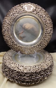 Magnificent set of antique silver plate charger plates