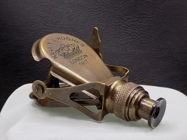 Collapsible hand held brass telescope or eyeglass