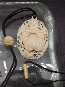 Vintage Oriental hand carved necklace