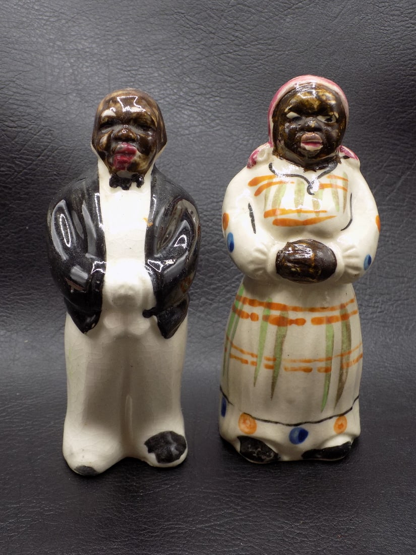 Vintage Black Americana salt and pepper shakers: Vintage Black Americana salt and pepper shakers. Butler and Mammy. Porcelain. Please see photos for condition. Nice colors. 4 ½ inches tall