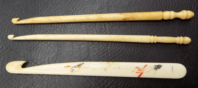 Three vintage Oriental hand carved darning hooks