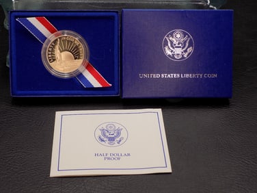 1986 Proof Liberty Half Dollar in original box.