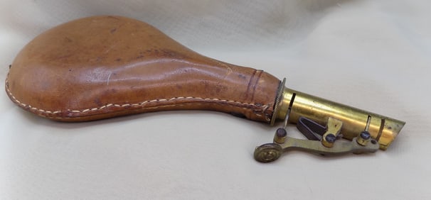 Antique leather powder horn with brass top
