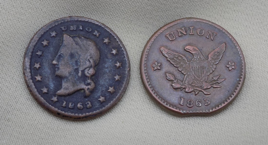 Two Civil War merchant tokens. 1863 D H Jones: Two Civil War merchant tokens. 1863 D H Jones. Staple and Fancy Dry Goods Racine Wisconsin. Please use photos for condition
