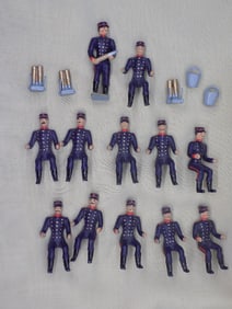 Collection of 12 vintage metal toy figures