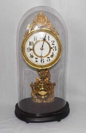 Antique fine french figural clock and running. Glass dome