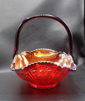 Beautiful sunset red Carnival glass basket. By Indiana Glass Company.