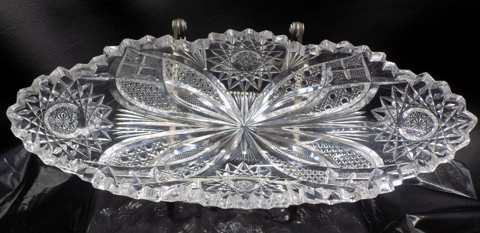 Elaborate American brilliant cut glass relish or candy tray: Elaborate American brilliant cut glass relish or candy tray. Great quality and detail. Did not find any condition problems. 11 1/2 long x 4 1/2 wide x 2 inches tall