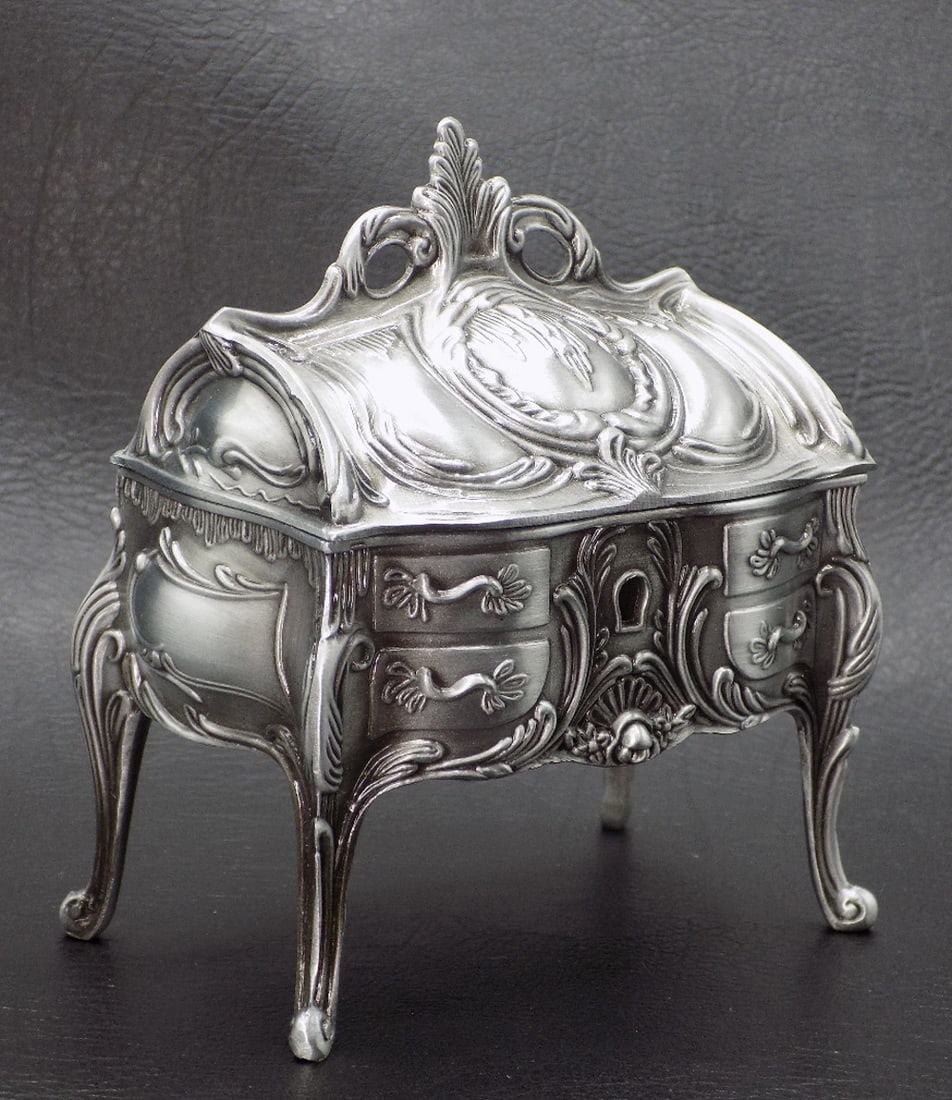 Ornate vintage slant front desk jewelry box: Ornate vintage slant front desk jewelry box. Great quality and detail. In very good original as found condition. No maker markings. Would look great in a doll house. 4 1/4 inches tall x 3 3/4 wide x 2